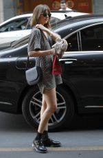 DAKOTA JOHNSON Out Shopping in Milan 09/25/2015
