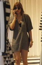 DAKOTA JOHNSON Out Shopping in Milan 09/25/2015