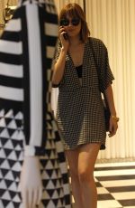 DAKOTA JOHNSON Out Shopping in Milan 09/25/2015