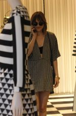DAKOTA JOHNSON Out Shopping in Milan 09/25/2015