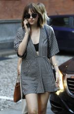 DAKOTA JOHNSON Out Shopping in Milan 09/25/2015
