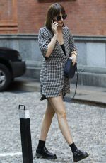 DAKOTA JOHNSON Out Shopping in Milan 09/25/2015