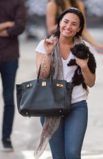 DEMI LOVATO and Her Dog Batman Leaves ABC Studios 08/31/2015