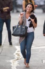 DEMI LOVATO and Her Dog Batman Leaves ABC Studios 08/31/2015