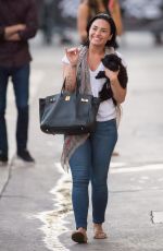 DEMI LOVATO and Her Dog Batman Leaves ABC Studios 08/31/2015