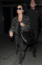 DEMI LOVATO Arrives at Heathrow Airport in London 09/07/2015