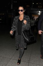 DEMI LOVATO Arrives at Heathrow Airport in London 09/07/2015