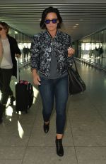 DEMI LOVATO at a Airport in London 09/10/2015