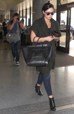 DEMI LOVATO at Los Angeles International Airport 09/28/2015