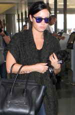 DEMI LOVATO at Los Angeles International Airport 09/28/2015