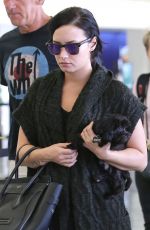 DEMI LOVATO at Los Angeles International Airport 09/28/2015