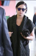 DEMI LOVATO at Los Angeles International Airport 09/28/2015