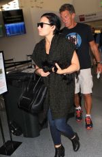 DEMI LOVATO at Los Angeles International Airport 09/28/2015