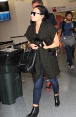 DEMI LOVATO at Los Angeles International Airport 09/28/2015