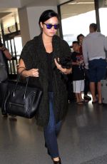 DEMI LOVATO at Los Angeles International Airport 09/28/2015