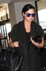 DEMI LOVATO at Los Angeles International Airport 09/28/2015