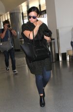 DEMI LOVATO at Los Angeles International Airport 09/28/2015