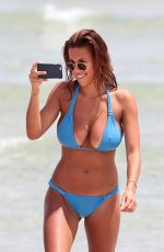DEVIN BURGMAN and NATASHA OAKLEY in Bikinis at a Beach in Miami 09/10/2015