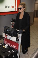 ELIZABETH OLSEN Arrives at Toronto Pearson International Airport 09/11/2015