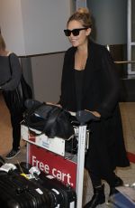 ELIZABETH OLSEN Arrives at Toronto Pearson International Airport 09/11/2015