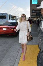 ELLE FANNING Arrives at Los Angeles International Airport 09/02/2015