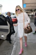 ELLE FANNING Arrives at Los Angeles International Airport 09/02/2015