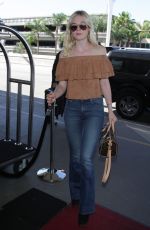 ELLE FANNING at LAX Airport in Los Angeles 08/31/2015