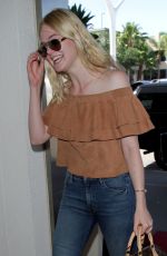 ELLE FANNING at LAX Airport in Los Angeles 08/31/2015