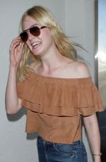 ELLE FANNING at LAX Airport in Los Angeles 08/31/2015