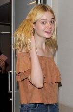 ELLE FANNING at LAX Airport in Los Angeles 08/31/2015