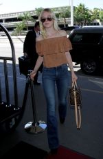 ELLE FANNING at LAX Airport in Los Angeles 08/31/2015
