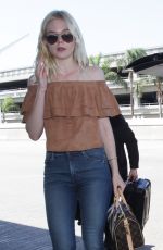 ELLE FANNING at LAX Airport in Los Angeles 08/31/2015