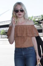 ELLE FANNING at LAX Airport in Los Angeles 08/31/2015