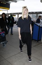 ELLE FANNING at Toronto International Airport 09/13/2015