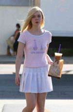 ELLE FANNING in Skirt Out and About in Los Angeles 09/21/2015