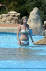 EMILY VANCAMP in Bikini ar a Pool in Italy 08/29/2015