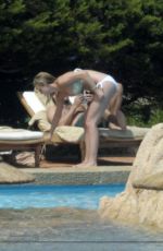 EMILY VANCAMP in Bikini ar a Pool in Italy 08/29/2015