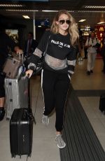 GIGI HADID at Milan-Malpensa Airport 09/26/2015
