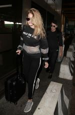 GIGI HADID at Milan-Malpensa Airport 09/26/2015