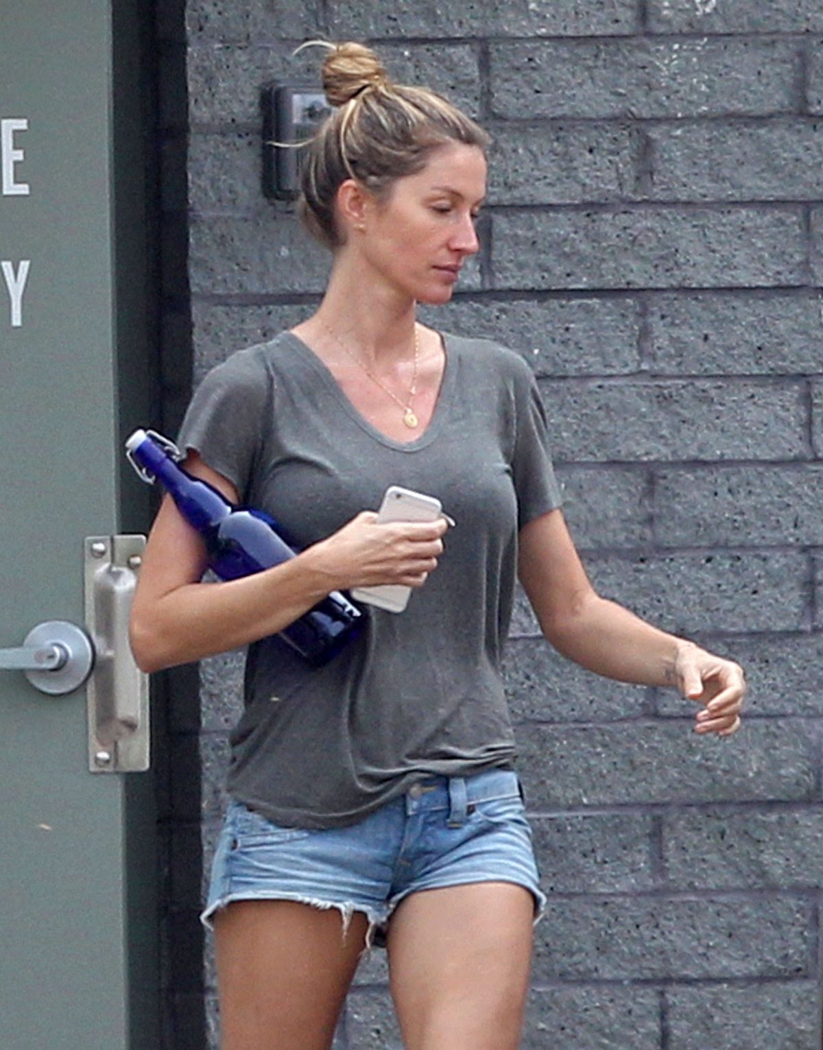 GISELE BUNDCHEN in Shorts at TB12 Sports Therapy Center in Foxborough 09/03/2015