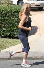 GOLDIE HAWN in Tights Out for a Walk in Brentwood
