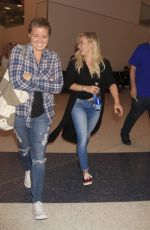HILARY DUFF in Jeans at Los Angeles international Airport 09/16/2015
