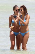DEVIN BRUGMAN and NATASHA OAKLEY in Bikinis at a Beach in Miami 09/10/2015