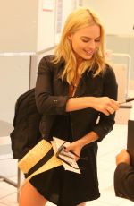 MARGOT ROBBIE Arrives at Toronto International Airport 08/28/2015