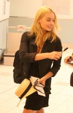 MARGOT ROBBIE Arrives at Toronto International Airport 08/28/2015