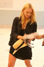 MARGOT ROBBIE Arrives at Toronto International Airport 08/28/2015