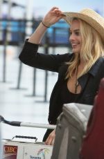 MARGOT ROBBIE Arrives at Toronto International Airport 08/28/2015
