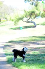 JAMIE CHUNG with Her Dog at a Park in British Columbia 09/30/2015
