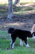 JAMIE CHUNG with Her Dog at a Park in British Columbia 09/30/2015