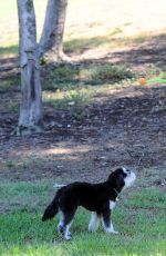 JAMIE CHUNG with Her Dog at a Park in British Columbia 09/30/2015